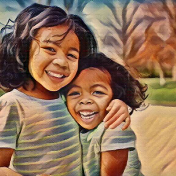 Two young children hugging and smiling