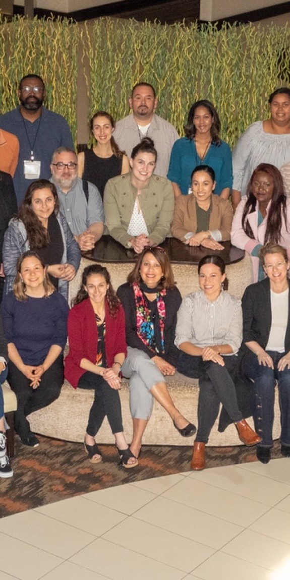 Wide angle photo of large group of NCYL staff